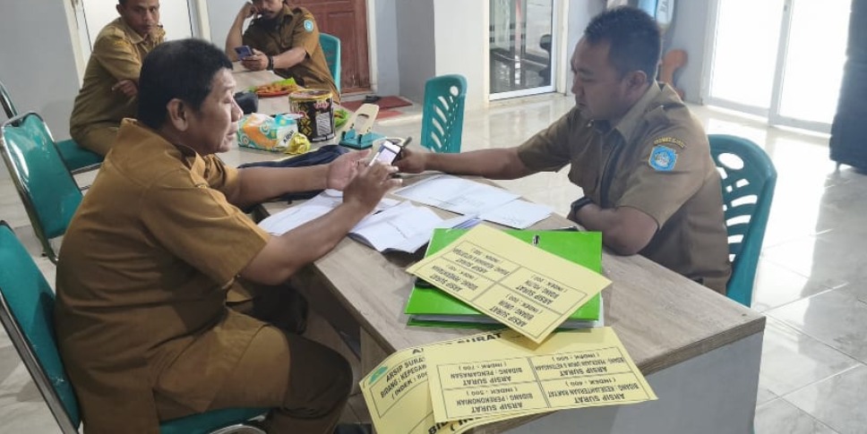 Foto: PEMBINAAN TATA KELOLA ARSIP DESA TLOGORETNO